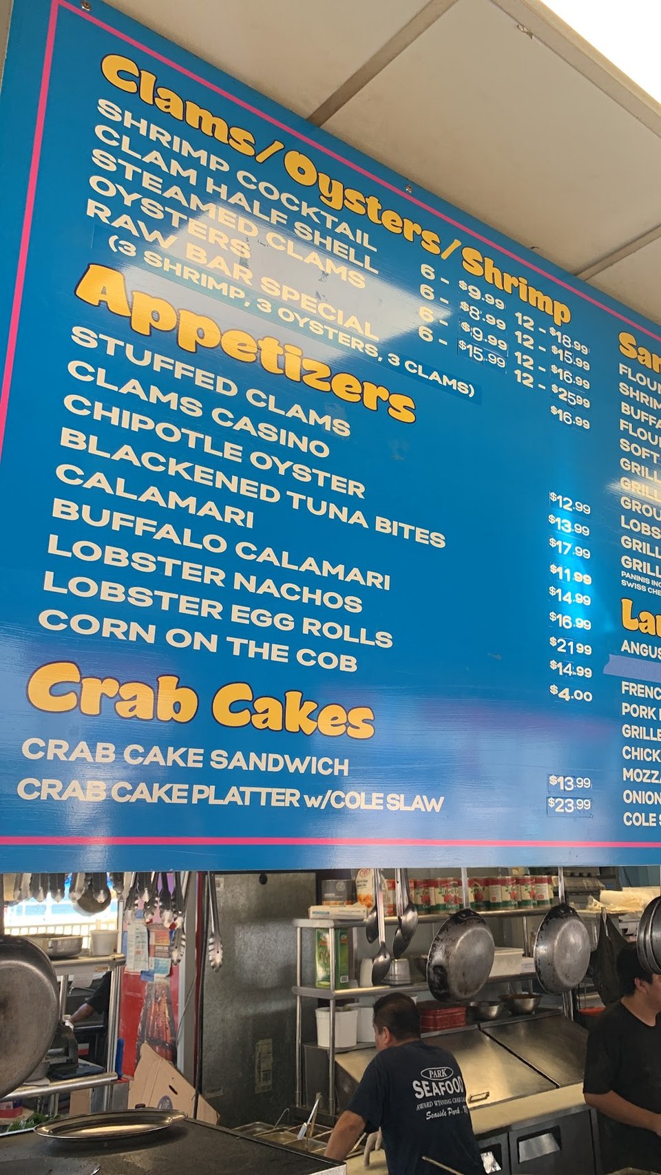 Printed menu featuring shrimp and crab dishes