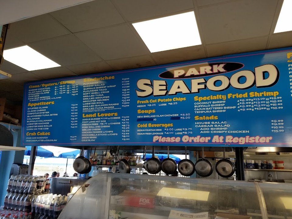 Restaurant menu with fried seafood selections