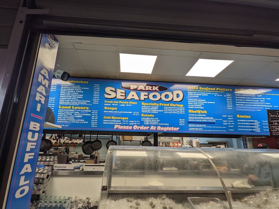 Menu layout showing seafood and burger items